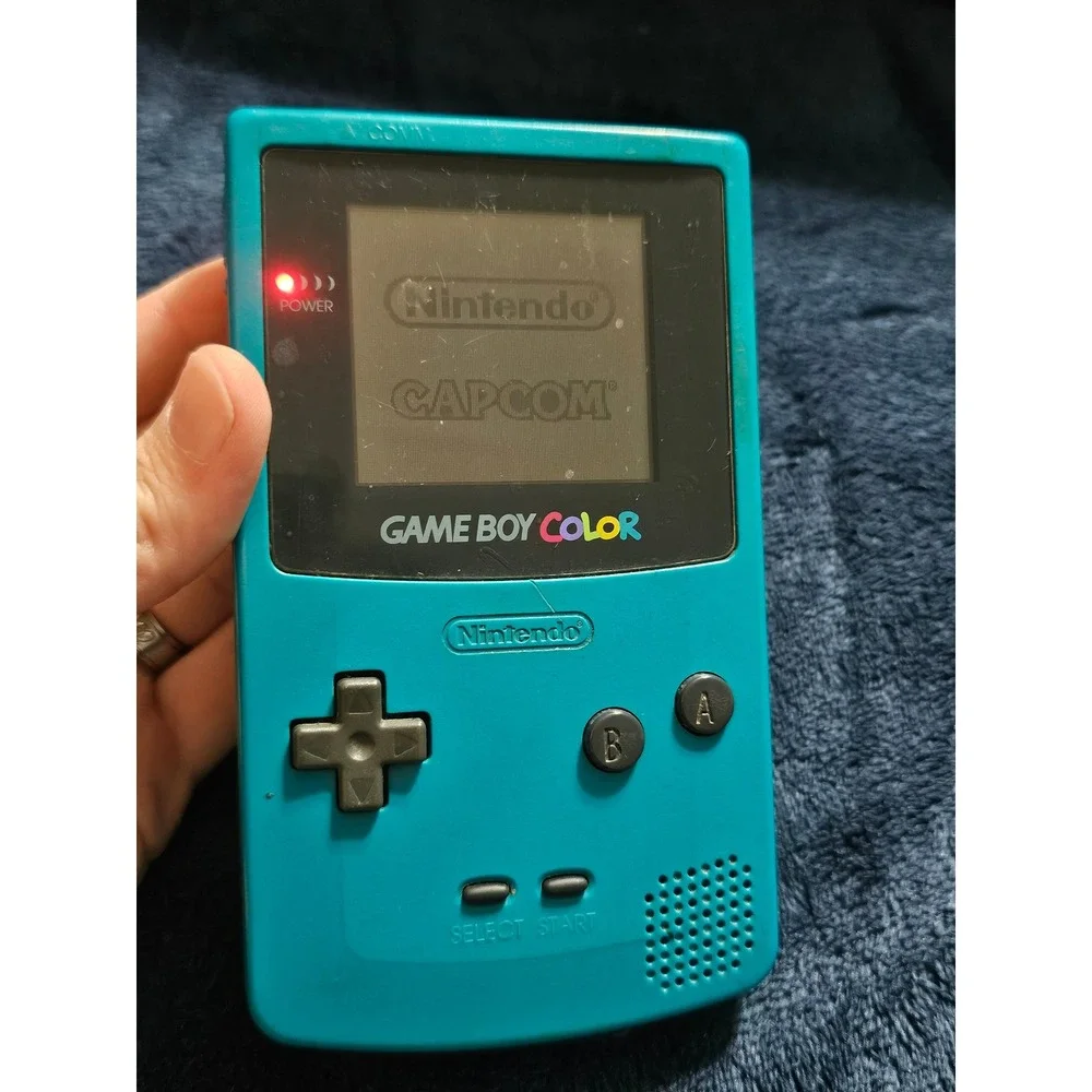 teal Nintendo Game Boy Color handheld console